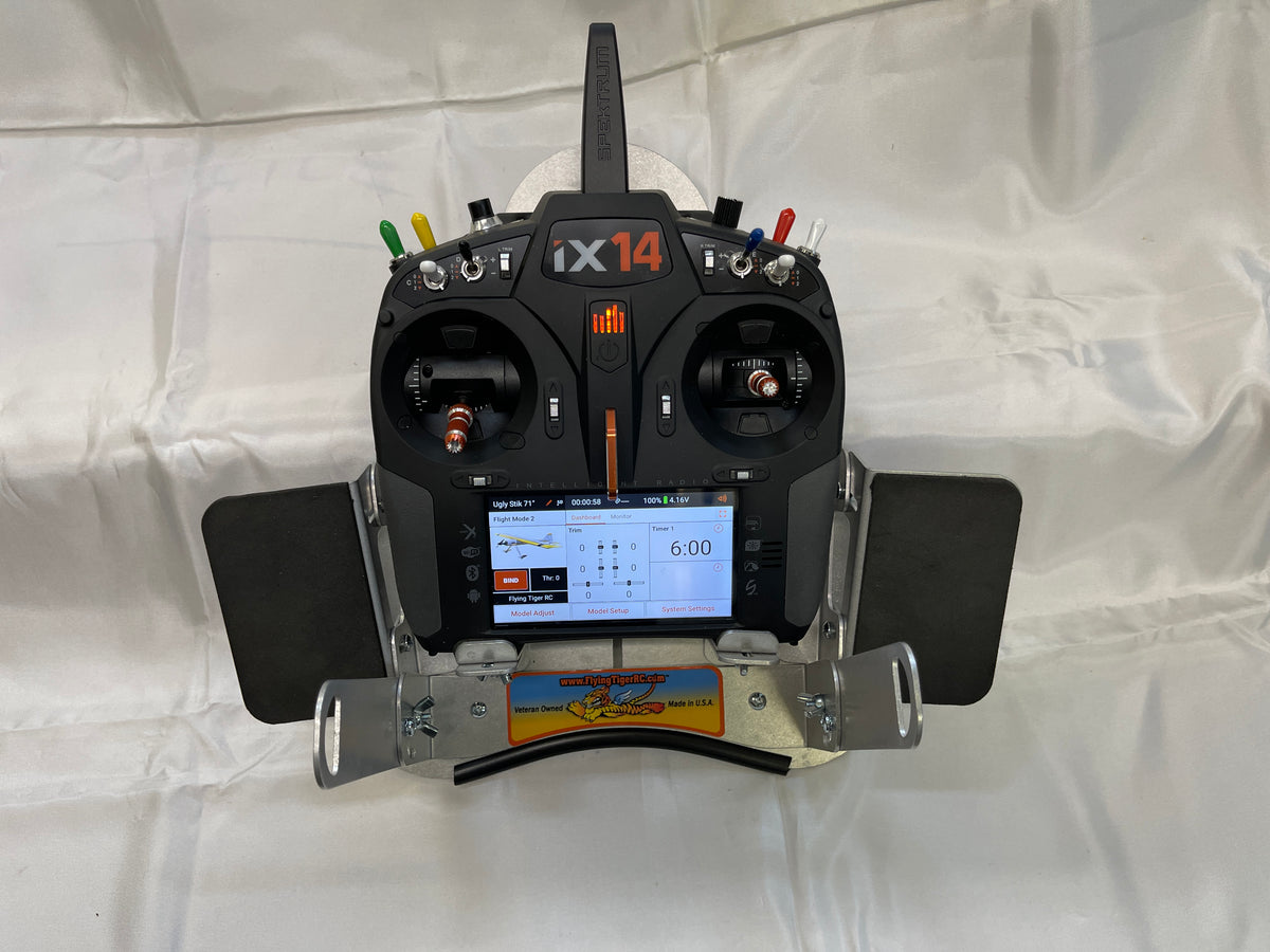 Flying Tiger RC transmitter tray with both hand pads fitted and a radio mounted, head-on view