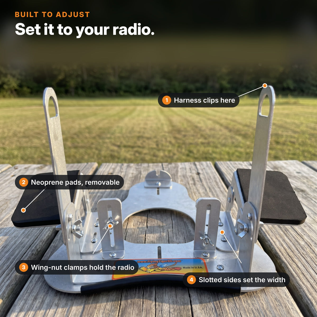 Tray features: harness clips to the uprights, removable neoprene pads, wing-nut clamps hold the radio, slotted sides set the width